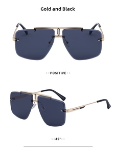 Detail view of black square rimless sunglasses with gold double bridge and G metal accent