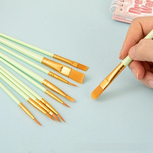 Detail of 10-piece light green nylon artist paint brushes set with multiple brush heads