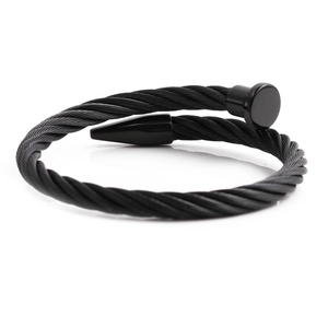 Minimalist black stainless steel cable bracelet with industrial nail design and twisted texture