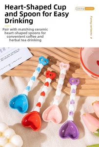 Detail of colorful heart-shaped ceramic spoons with embossed patterns and cut-out handles
