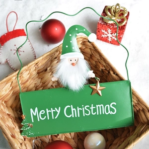 Merry Christmas metal sign decoration with Santa gnome in rustic woven basket