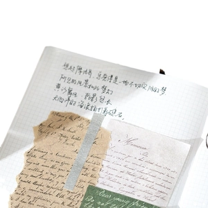 Vintage scrapbooking material kit with retro paper and decorative stickers for journaling