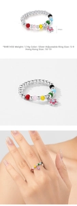 Macro detail of S925 silver beaded ring with colorful facets and pink flower charm