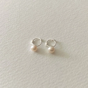 Minimalist 925 sterling silver hoop earrings with delicate pink freshwater pearl charms