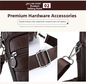 Detail of dark brown litchi leather texture with premium silver-tone metal zippers and hardware