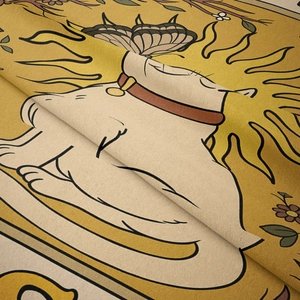 Close-up of bohemian cat tapestry texture featuring vintage sun and floral patterns