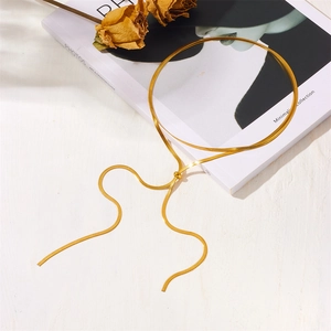 Minimalist gold snake chain necklace with adjustable slider bead on white background