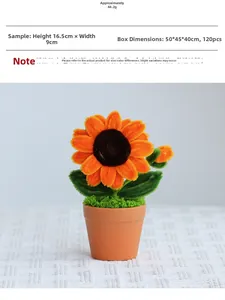 Close-up of handmade crochet sunflower plant in clay pot with dimensions 16.5cm x 9cm