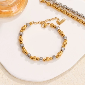 Minimalist 18K gold-plated stainless steel beaded bracelet with twill texture beads