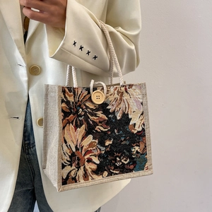 Vintage floral linen tote bag with woven jacquard pattern, rope handles and wood button