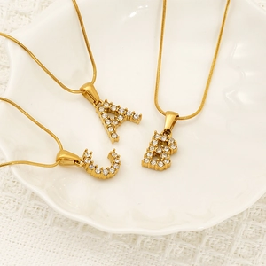 Gold stainless steel snake chain necklace with crystal-encrusted A, B, C letter pendants