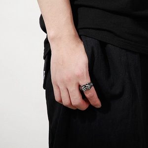 Retro hip-hop style stainless steel ring for men featuring a unique double fist design