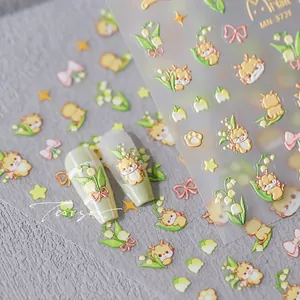 Macro detail of 5D embossed nail stickers featuring cute deer and lily of the valley