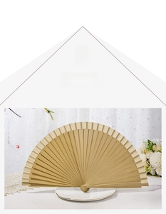Close-up of minimalist natural wood folding fan showing plain matte wooden ribs and structure