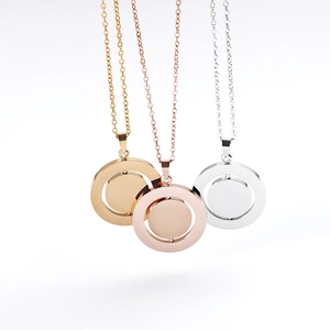 Rotating round pendant necklace in gold, rose gold, and silver stainless steel