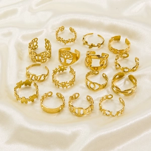 14-piece gold-plated stainless steel ring set with tree of life and floral designs