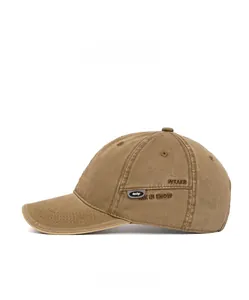 Detail view of khaki cotton baseball cap showing side embroidery and small design label