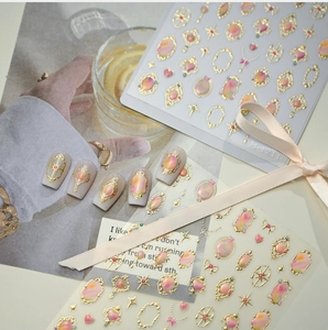 Detail of M-1211 relief nail stickers with gold vintage frames and watercolor patterns