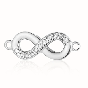 Detailed view of silver infinity pendant connector with crystals and dual link rings