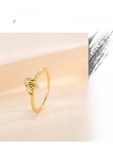 Detailed view of the gold-plated coconut tree design ring with polished tropical palm motifs