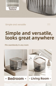 Detail of translucent striped trash bin with wood texture rim for home or office desk
