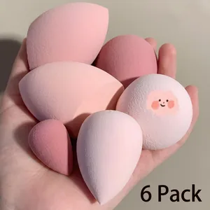 Set of 6 ultra-soft gradient pink makeup sponges in various shapes for flawless makeup