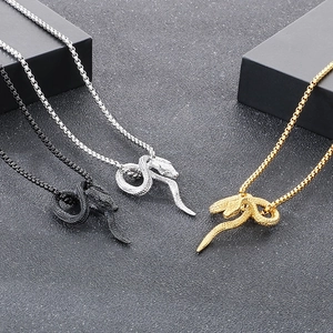 Punk style snake pendant necklaces in black, silver, and gold stainless steel finish