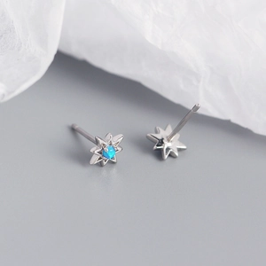 Macro di orecchini a stella ottagonale in argento S925 con intarsi in opale blu