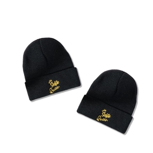Fashionable black knitted beanie hat with yellow Selfie Queen crown embroidery for winter