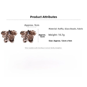 Detail showing dimensions of leopard print raffia flower earrings with bead center