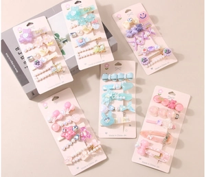 Détails de barrettes en résine colorée aux formes de cœur, d'étoile et d'ours