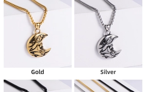 Detail showing Gothic moon and skull pendants in gold and steel finishes on a pedestal