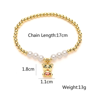 Gold plated bead and pearl bracelet with cute bear charm and adjustable chain