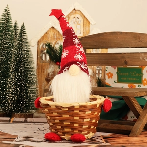 Christmas gnome candy basket with red striped hat and woven base for festive home decor