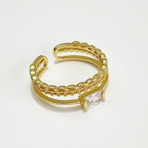 Double layered 925 sterling silver ring in gold with rectangular zircon and dot texture