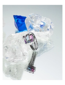 Macro detail of silver adjustable ring featuring a gradient blue-purple square zircon