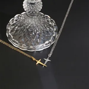 Minimalist stainless steel cross necklace set in gold and silver finish with thin chains