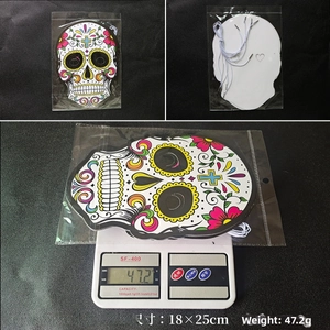 Detail view of colorful Day of the Dead skull mask showing 18x25cm size and 47.2g weight