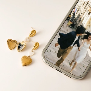 Golden heart locket earrings with shell stud and romantic photo locket feature
