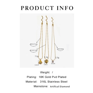 Detail of 316L stainless steel necklace pendants with 18K gold PVD and cubic zirconia