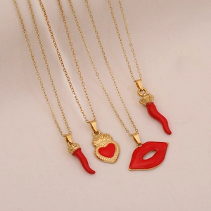 Gold chain necklaces with red enamel chili, sacred heart and lip pendants for women