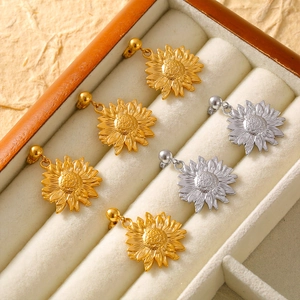 Elegant gold and silver sunflower earrings in titanium steel for professional jewelry display