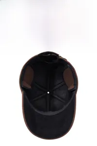 Close-up of winter baseball cap with foldable ear flaps and warm black inner lining