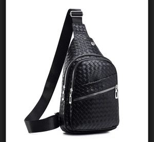 Close-up of black woven texture PU leather sling bag with zipper detail and earphone port