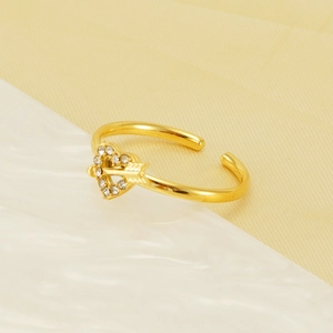 Gold-plated open ring with heart and Cupid's arrow design featuring sparkling zircons