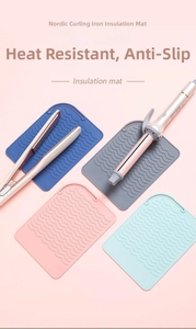 Close-up of wavy silicone heat resistant mats for hair styling tools in Nordic colors