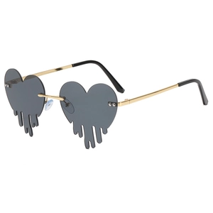 Unique heart-shaped melting sunglasses with gold metal frame and dark grey lenses