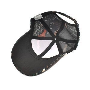 Internal view of floral print baseball cap showing 100% polyester fabric and stitching