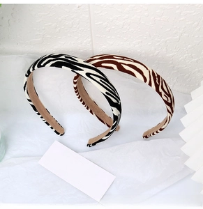 Detail of zebra pattern headbands with soft fabric texture and non-slip inner lining