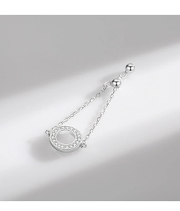 Detail of S925 silver hollow circle ring featuring small diamonds and delicate chains